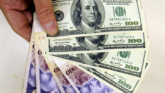 Dólares y pesos - Blanqueo de capitales