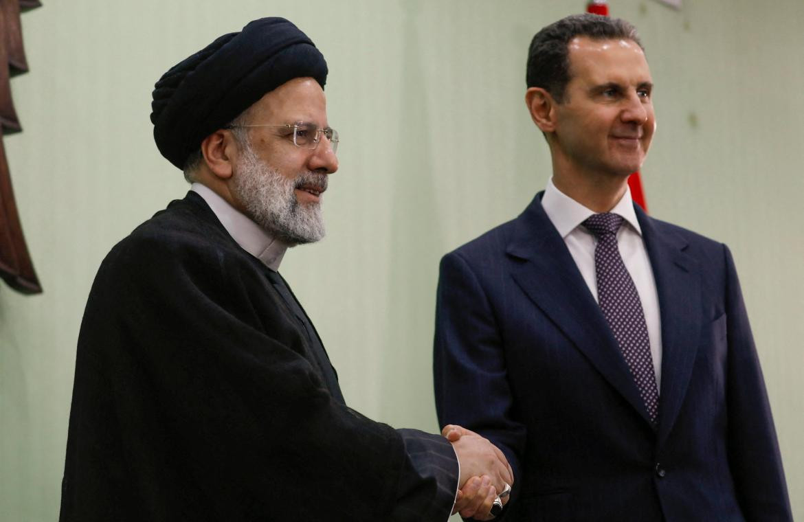 El presidente de Siria Bashar al-Assad y el presidente iraní Ebrahim Raisi _Foto Reuters