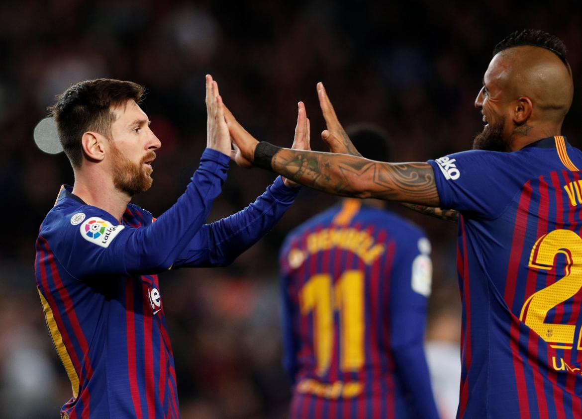Festejo de Messi y Vidal en el Barcelona (Reuters)