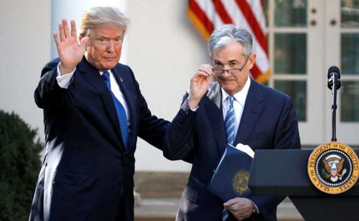 Jerome Powell, el titular de la Fed y Trump REUTERS