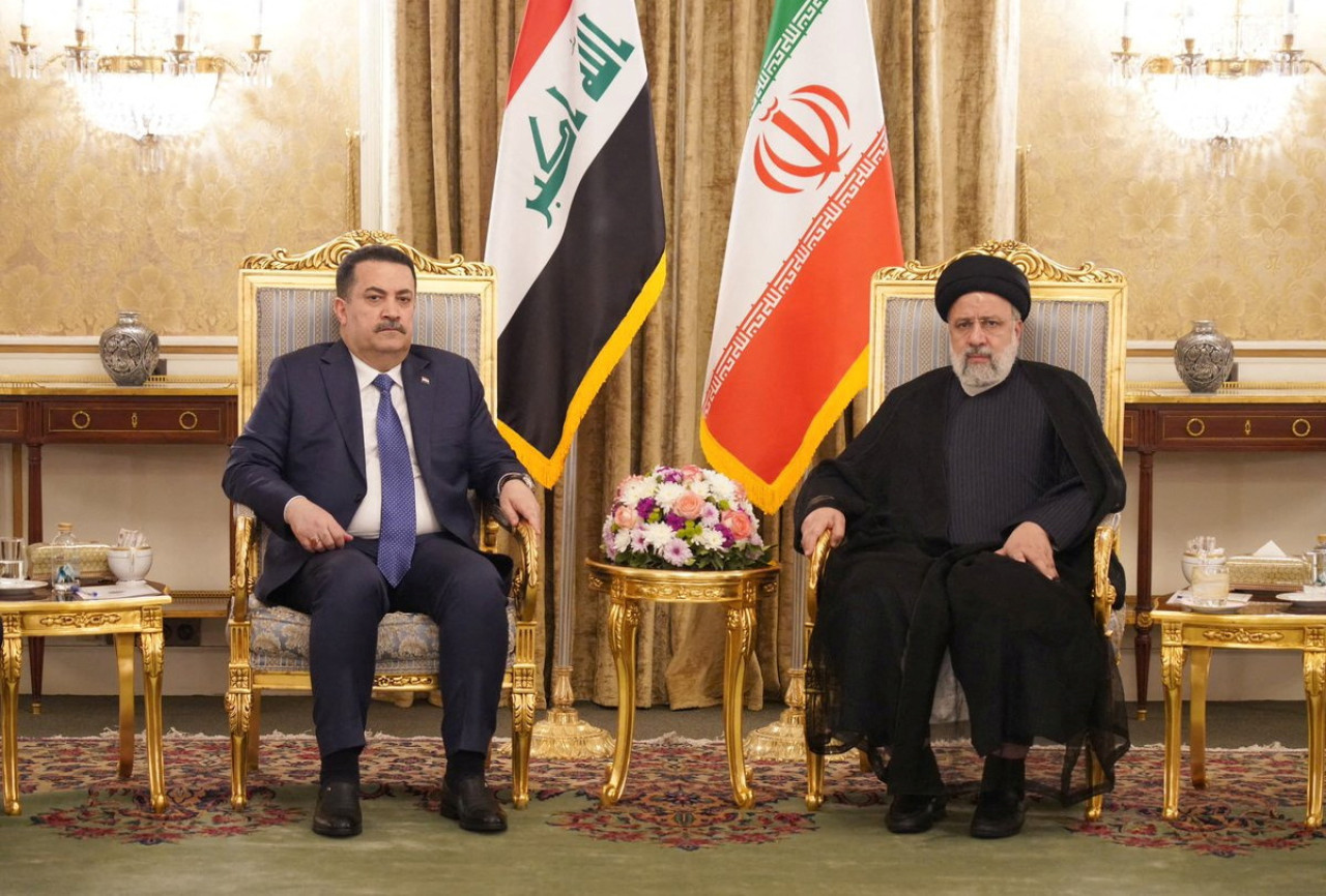 Al-Sudani, primer ministro de Irak con Raisí, su par iraní. Foto: Reuters.