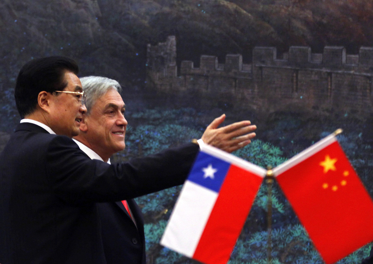 Sebastián Piñera y el expresiente chino, Hu Jintao. Foto: NA